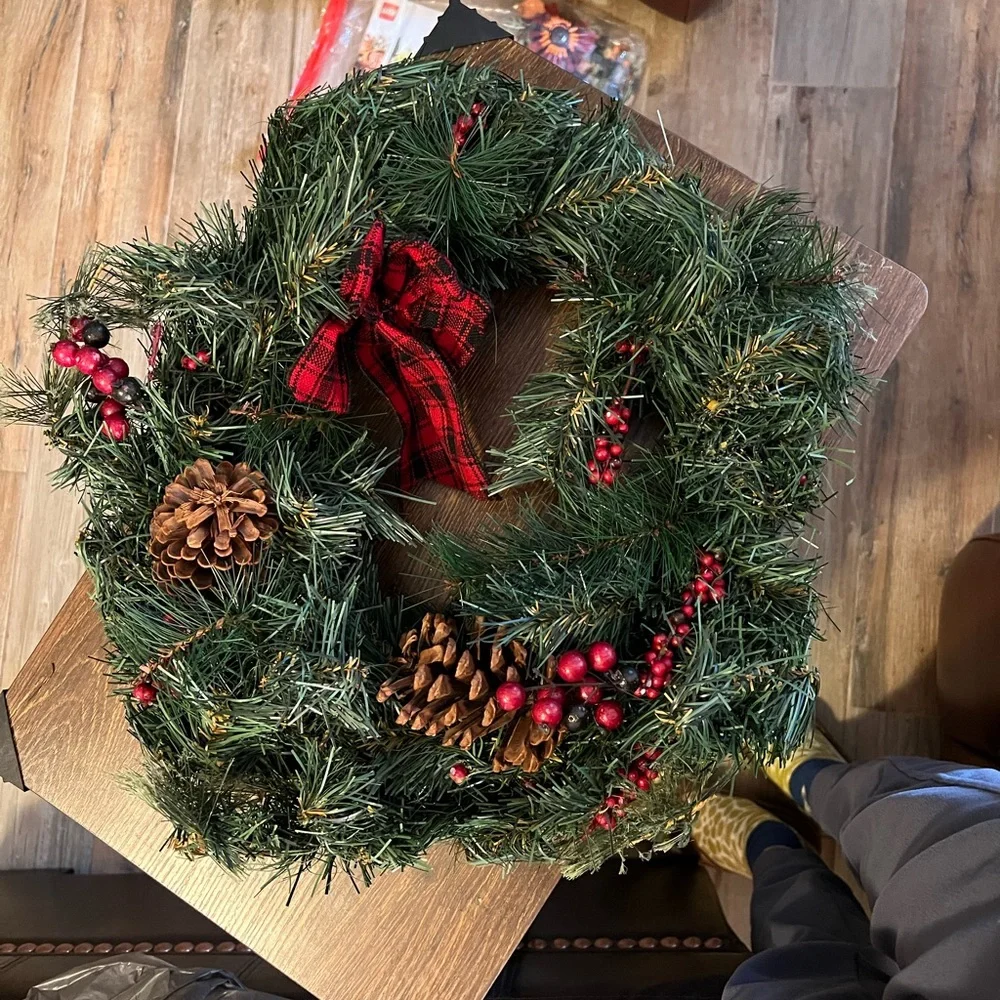 Festive Green Holiday Wreath with Red Accents